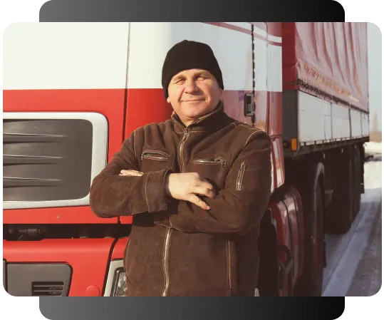 man standing in front of a red and white truck